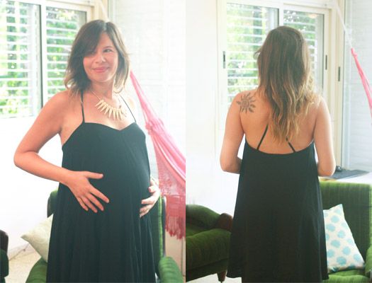 רוני קנטור בהריון לובשת שמלה שחורה